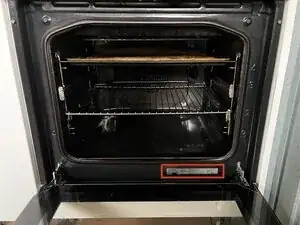 Hinge of the oven door