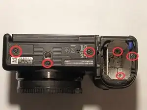 Teardown Sony ZV-E10 to reach SD card slot