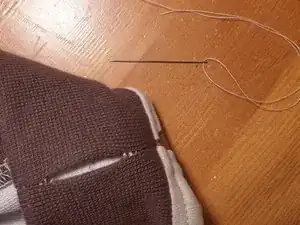 Repairing an open seam with a ladder stitch / invisible stitch