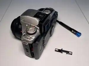 Film door latch