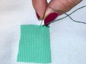 How to Hand Stitch a Patch to Clothing
