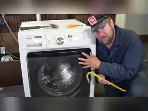 How to Unlock a Stuck Washing Machine Door or Lid Lock
