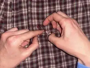 How to Sew a Hole in a Shirt Pocket