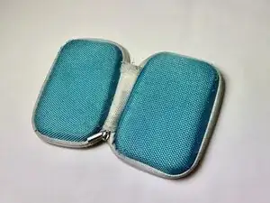 How to Repair a Daiso Earphone Case with a Torn Fabric Hinge