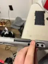 This step is a break from removing screws. All of the parts have a button to remove them.