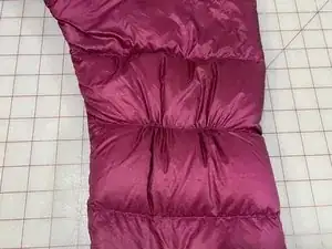 Como soltar um ponto enroscado em um casaco isolado