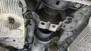 Rotate the bearing to the opposite side to access area to cut in order to fully remove the OEM bearing carrier.