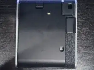Disassembling FujiFilm instax mini 40 Outer shell