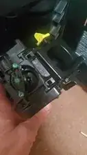 Its much easier to lean it away from the machine, match the rails to the BG and then tip it back up to flat before slidin g it in. See video