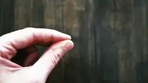 Cut a length of thread approximately 24 inches (~61 cm) long.