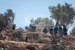 Gás lacrimogêneo disparado contra manifestantes em Beita, julho de 2021.