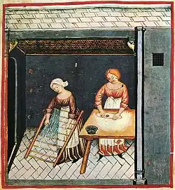Mulheres preparando macarrão, em imagem do livro Tacuinum sanitatis.