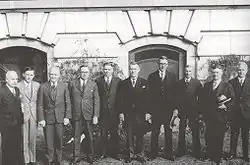 Photo of ten cabinet members standing in a row.