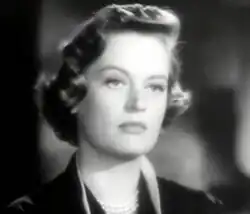 Alexis Smith (Kay Garven, a esposa infiel)