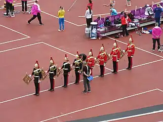 A banda que tocava uma fanfarra antes da final de cada modalidade.