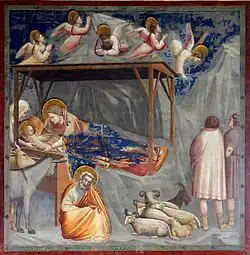 Natividade na Cappella degli Scrovegni por Giotto, muito próxima formalmente da escultura de Pisa.