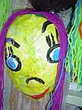 Cabeção, trabalho artesanal em papel machê.