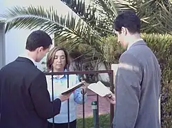 Envagelização porta-a-porta de Testemunhas de Jeová.