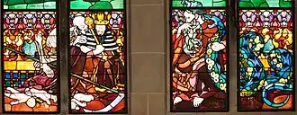 Detalhe do vitral da Adoração: Herodes e a Morte (à esquerda) e o Diabo com a Serpente (à direita), obra de Józef Mehoffer na Cathedral em Friburgo, Suíça