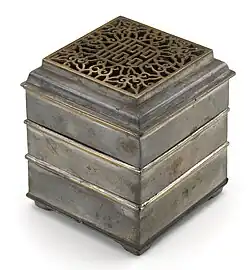 Fotografia de um antigo relógio de incenso chinês