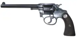 Um Colt Police Positive Special (.32 Smith and Wesson Long) e cano de 6&nbsp;polegadas&nbsp;(152&nbsp;milímetros)