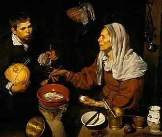 Bodegón com elementos de pintura de gênero — cozinha. Old Woman Frying Eggs por Diego Velázquez; 1618, 101 × 120&nbsp;cm, Galeria Nacional da Escócia.