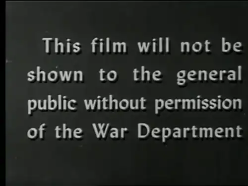 00:17:14 - "Este filme não será exibido ao público em geral sem a permissão do Departamento de Guerra"