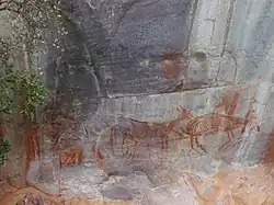 Animais pintados sobre pedra.