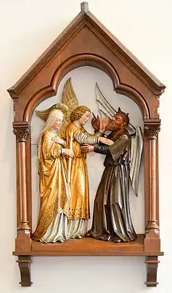 Miniatura que retrata Genoveva com um anjo à sua direita e um demônio à sua esquerda.