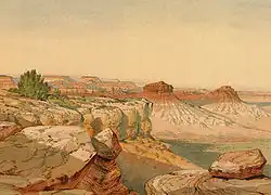 Entardecer no Deserto Kanab. De uma formação do Permiano- Um elevado de rocha Permiana no primeiro plano, rochas escarlates (Vermillion Cliffs) à distância e solo arenoso branco do Jurássico à extremidade no fundo. Grand Canyon, Condado de Mohave, Arizona. (Holmes, 1877)