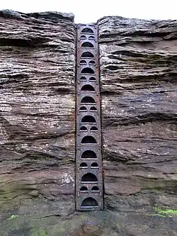 Escada de ferro na Ilha Hilbre, Inglaterra