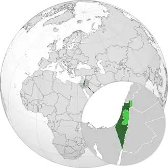 Localização de Israel (em verde) e dos territórios ocupados por Israel (em verde claro) no globo.