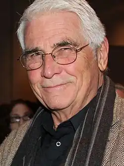 Actor James Brolin staring towards a camera taking his picture in 2013.