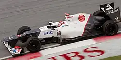 Kamui Kobayashi pilotando a Sauber C31 no Grande Prêmio da Malásia de 2012.