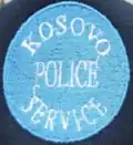 First cap badge of the Kosovo Police Service