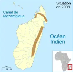 Sua distribuição está compreendida na área em marrom.