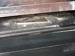 Pedra lunar da missão Apollo 17, que os visitantes podem tocar.