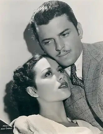 Movita e John Carroll em foto de divulgação de Wolf Call