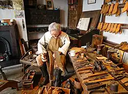 Oficina de sapateiro.