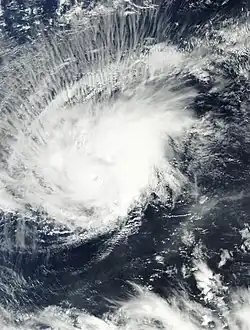 Banding features become increasingly defined, and an eye appears, signifying the storm's intensification into a hurricane