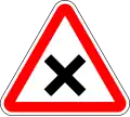 A24 - Cruzamento ou entroncamento: indicação da proximidade de um cruzamento ou entroncamento onde vigora a regra geral da prioridade à direita; este sinal só excepcionalmente pode ser usado no interior das localidades;