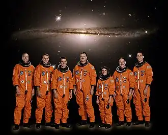 Massimino, Linnehan, Carey, Altman, Currie, Grunsfeld e Newman