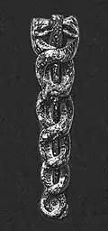 Serpente do deus Ninguiszida no vaso de libação de Gudea, por volta de 2&nbsp;100 a.C..
