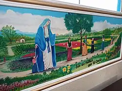 Painel artístico representando o sonho de Amabile com Nossa Senhora.