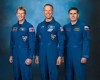 Da esquerda para a direita: Peake, Kopra e Malenchenko.