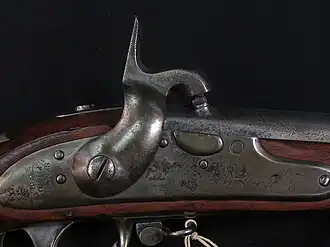 Close do mecanismo de ação do Springfield Model 1822 convertido para percussãoClose do mecanismo de ação do Springfield Model 1822 convertido para percussão.