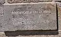 Inscrição epigráfica, referindo a remodelação e a transladação.