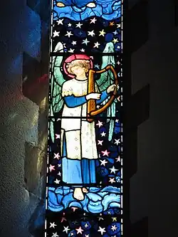 Janela de anjo na St. James's Church, Staveley, Cumbria