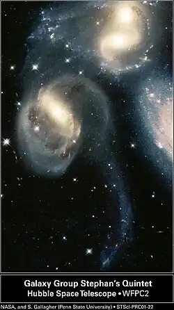 Pelo Telescópio Espacial Spitzer