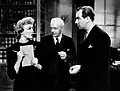 Eve Arden, Harry Davenport e Melvyn Douglas em cena do filme
